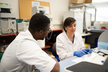 Multiracial Scientists Researching In The Laboratory.