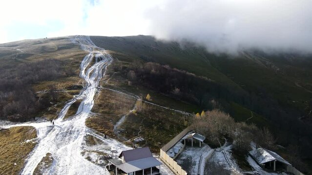 aerial view of travel landmark autumn mountains with snow
