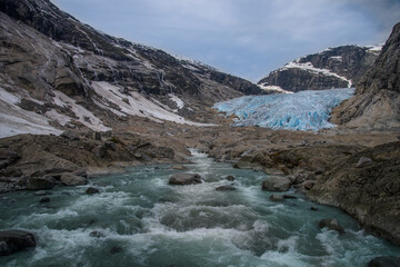 Fototapeta na wymiar a glacial river beneath the melting glacier of Patagonia.