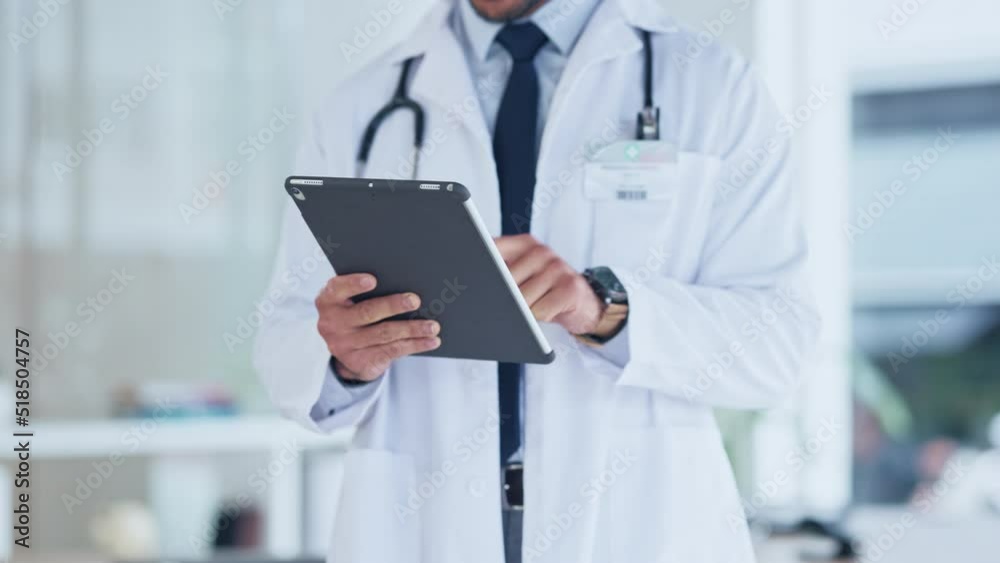 Aufkleber hands of a doctor using a tablet in the hospital. closeup of a healthcare professional using a wirel