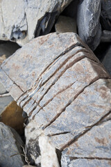 Industrial cut of stone blocks in a quarry. Stone processing or geology.