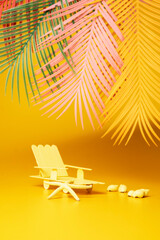 Beach chair on yellow background. - Summer concept..