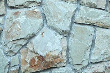 Stone surface as background, closeup. Seamless texture