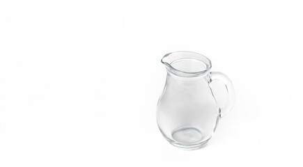 Side view of glass water jug on white background. Space for text, for advertising, banner,...