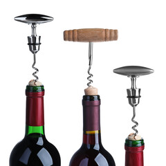 Opening bottles of wine with corkscrews on white background