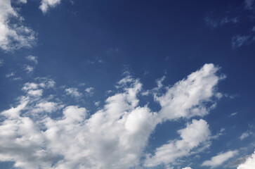 Abstract image of blurred sky. Blue sky background with cumulus clouds