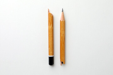 Broken pencil on white background, flat lay. Pause concept