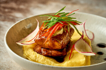 Catfish steak in sweet and sour sauce with mashed potatoes. Selective focus, close-up
