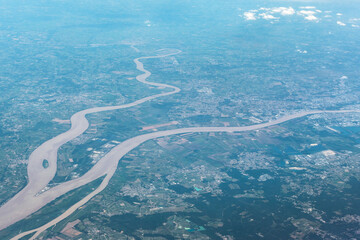 Aerial view of marshlands , small towns, farms and river from airplane.
Amsterdam, North Holland, Netherlands