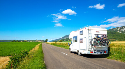 Fototapeta na wymiar family road trip travel- camper van traveling, motorhome on the road