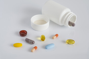 vitamin pills white bottle for drugs on white background