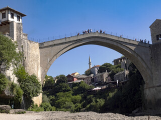 Obraz na płótnie Canvas Mostar on the Neretva River is one of the largest cities in Bosnia and Herzegovina. The Old Bridge is on the UNESCO cultural heritage list.