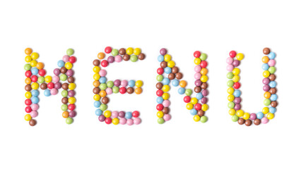 Isolated word MENU. Multi-colored round candies on white backgrounds.