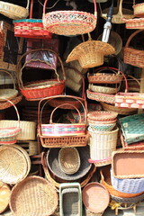 Various shapes and sizes of woven bamboo and rattan baskets sell in traditional markets.