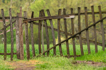 Fototapeta premium Selective focus shot of dirt road in mountain.