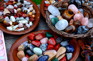 bowls and boxes of shiny colored stones in the gift shop. children and superstitious women love to...