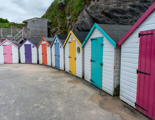 beach huts with colourful doors