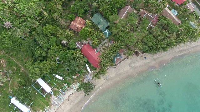 Top down rotating view from the nice white sand beach of Puerto Galera, Philippines