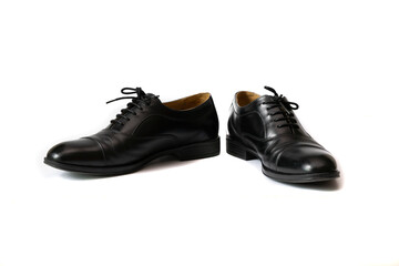 Classic male black leather shoes isolated on a white background