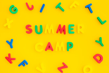 Summer vacation and hike concept. Words Summer Camp made of colorful letters