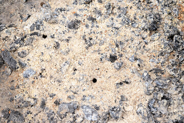 Wood ash and coal. Background, texture full frame. Natural fertilizer and pest control. Grill bottom.