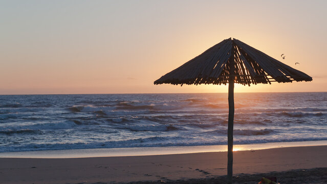 Beach Ocean Sunrise Umbrella Silhouetted Summer Morning Landscape.