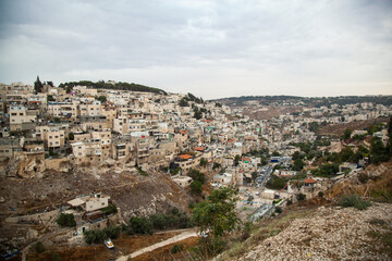 Brazilian slums in Jerusalem. Many small and poor houses in the gorge. Dense historical buildings...