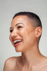 Studio portrait of smiling woman