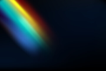 Rainbow highlights on a black background.Glare or reflection from water and glass.Glittering particles for social media backgrounds, product presentations, photo shots.