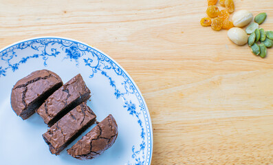 Delicious chocolate brownie homemade, ingredients of brownie,closeup fudge brownie,homemade bakery and dessert,Pieces of fresh brownie,confectionery concept.