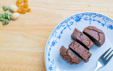 Delicious chocolate brownie homemade, ingredients of brownie,closeup fudge brownie,homemade bakery and dessert,Pieces of fresh brownie,confectionery concept.