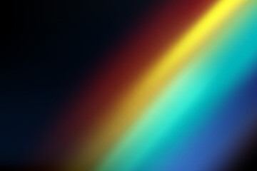 Rainbow highlights on a black background.Glare or reflection from water and glass.Glittering particles for social media backgrounds, product presentations, photo shots.