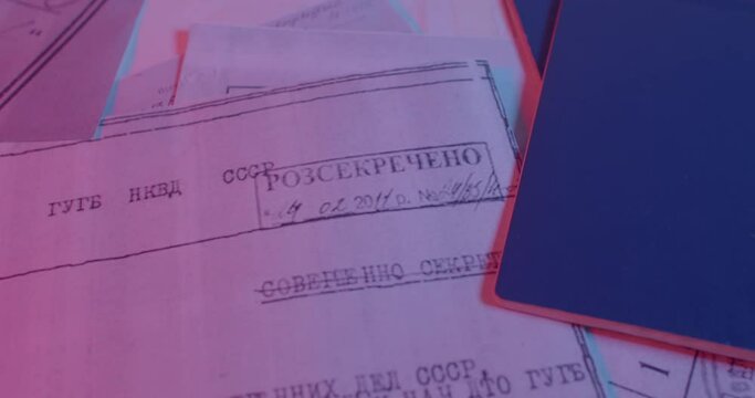 Printed on paper, secret. Case number, secret notes, cipher. A dark room document movement of the camera, the documents of the NKVD worker are on the table. CZ, Kladno, Polska, 19.4.22.
