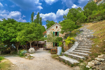 Fototapeta na wymiar Tavern near Roski slap waterfall, Croatia