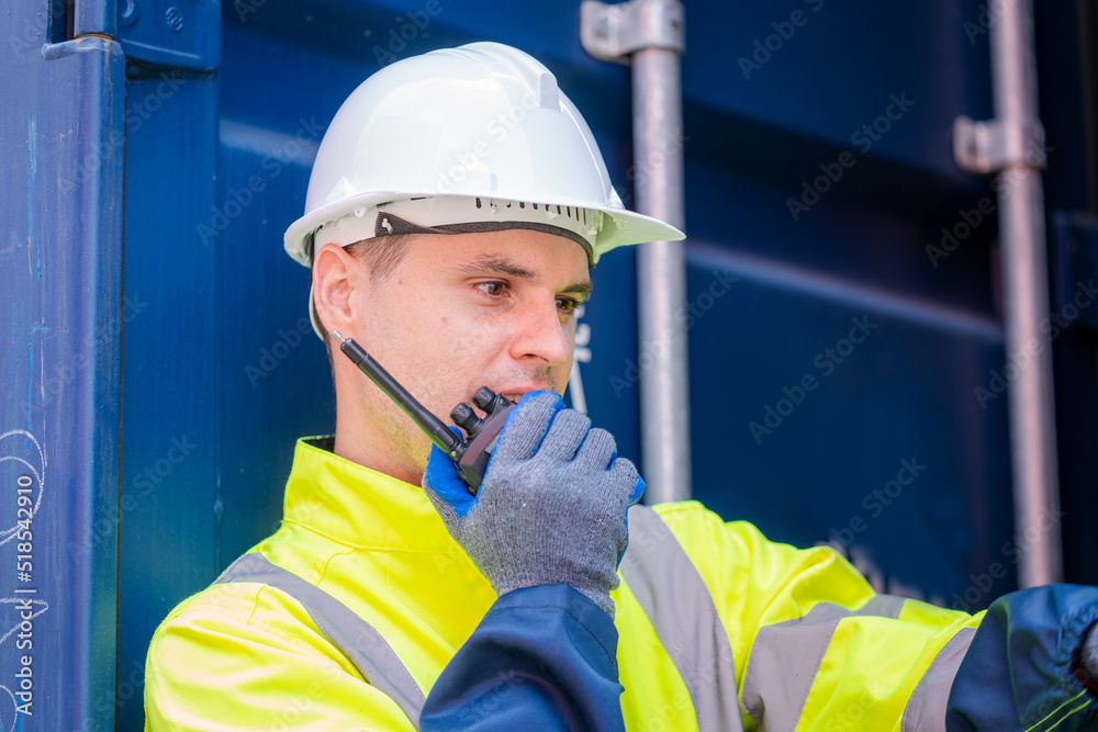 Poster container yard worker checking container at container yard warehouse,logistics transportation and sh
