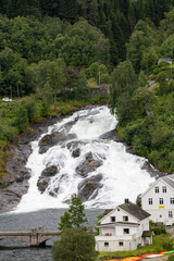 Fototapeta na wymiar Hellesyltfossen waterfall in Hellesylt Møre og Romsdal at Sunnylvsfjorden near Geirangerfjorden in Norway (Norwegen, Norge or Noreg)