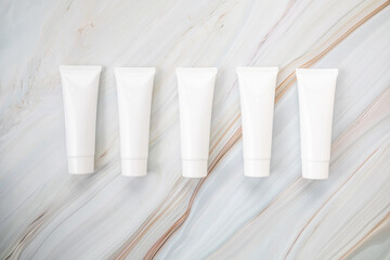 cream tube skincare package on background marble