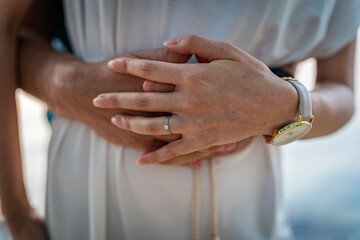 bride and groom holding hands