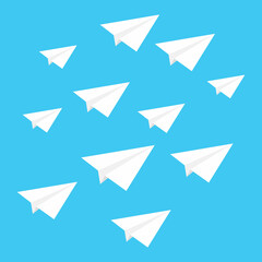 Paper plane in white on blue background.