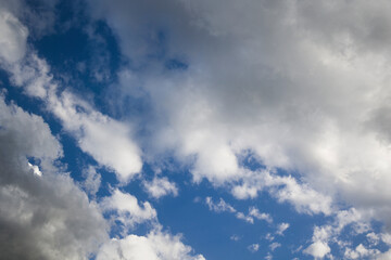 dramatic blue sky with dark clouds