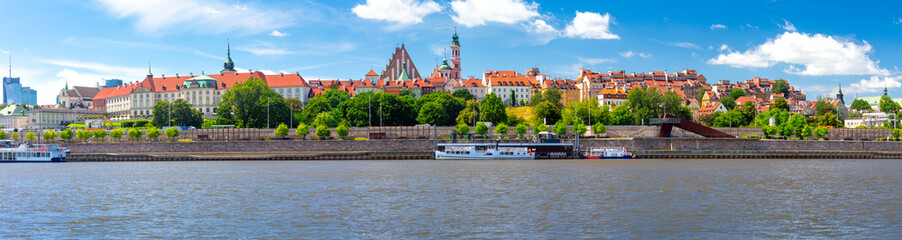 Warsaw. Panorama of the city embankment on a sunny day.