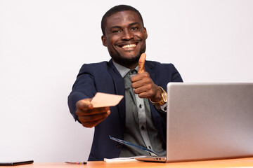 african businessman giving someone a check