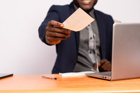 African Businessman Giving Someone A Check