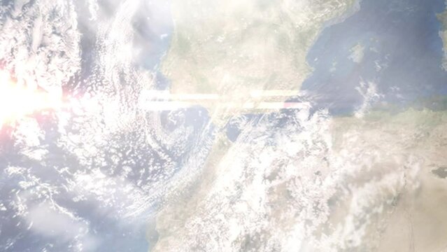 Earth zoom in from outer space to city. Zooming on Algeciras, Spain. The animation continues by zoom out through clouds and atmosphere into space. Images from NASA