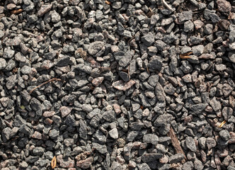 Small pebbles of crushed stone as an abstract background.