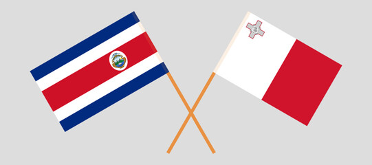 Crossed flags of Costa Rica and Malta. Official colors. Correct proportion