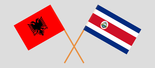 Crossed flags of Albania and Costa Rica. Official colors. Correct proportion