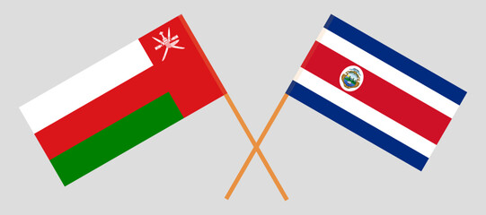 Crossed flags of Oman and Costa Rica. Official colors. Correct proportion