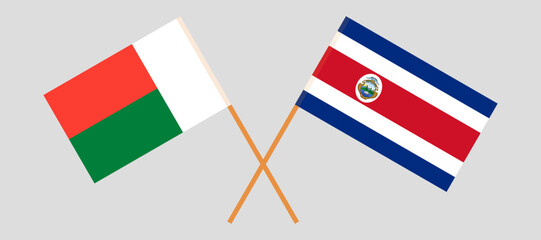 Crossed flags of Madagascar and Costa Rica. Official colors. Correct proportion