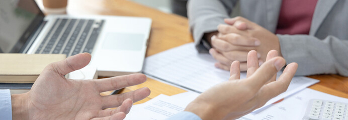 Brainstorm team, Marketers and financial accountants are discussing charts to plan strategies to meet customer needs, Using graphs to analyze business data, Meetings or business consulting.